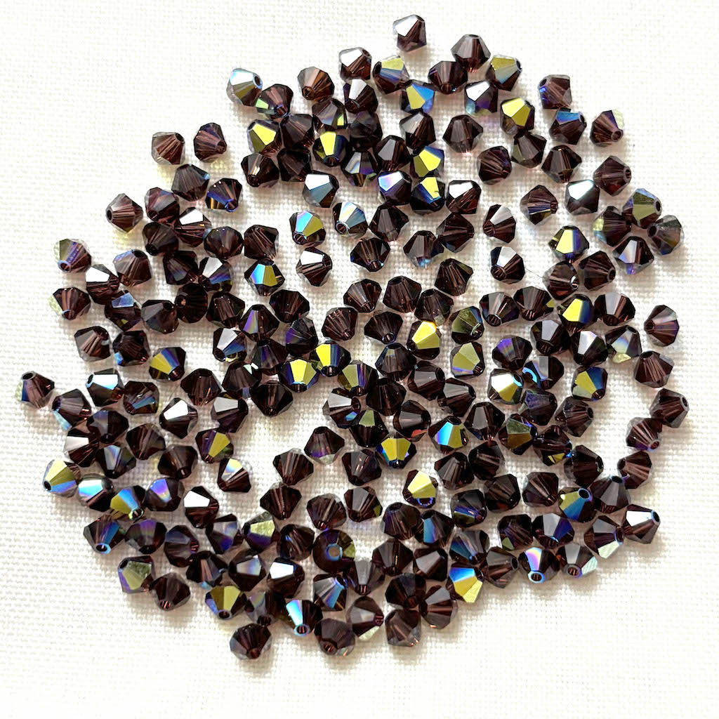 Cristal Tupi Austríaco de 4mm - 50und - Púrpura oscuro AB