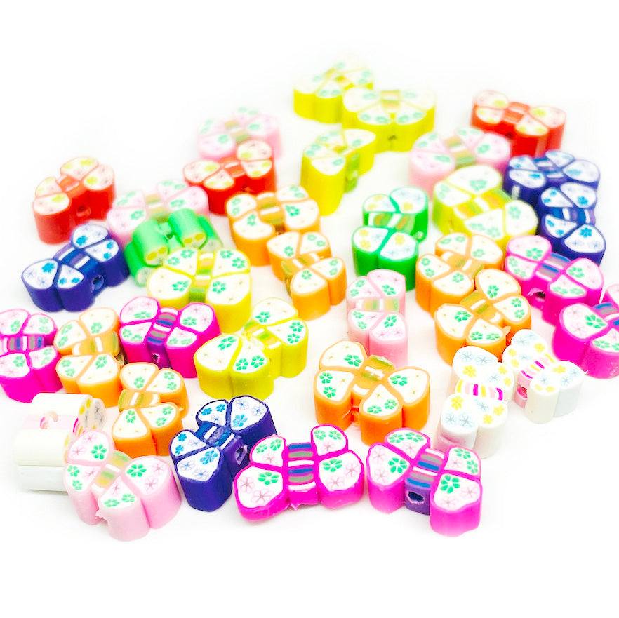 Cuentas Arcilla polimérica - Mariposas - 9mm - Set 10und