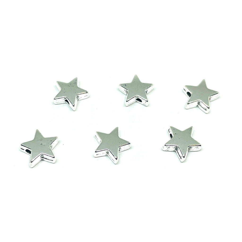 Separador Estrella plateado - 9mm - 6und
