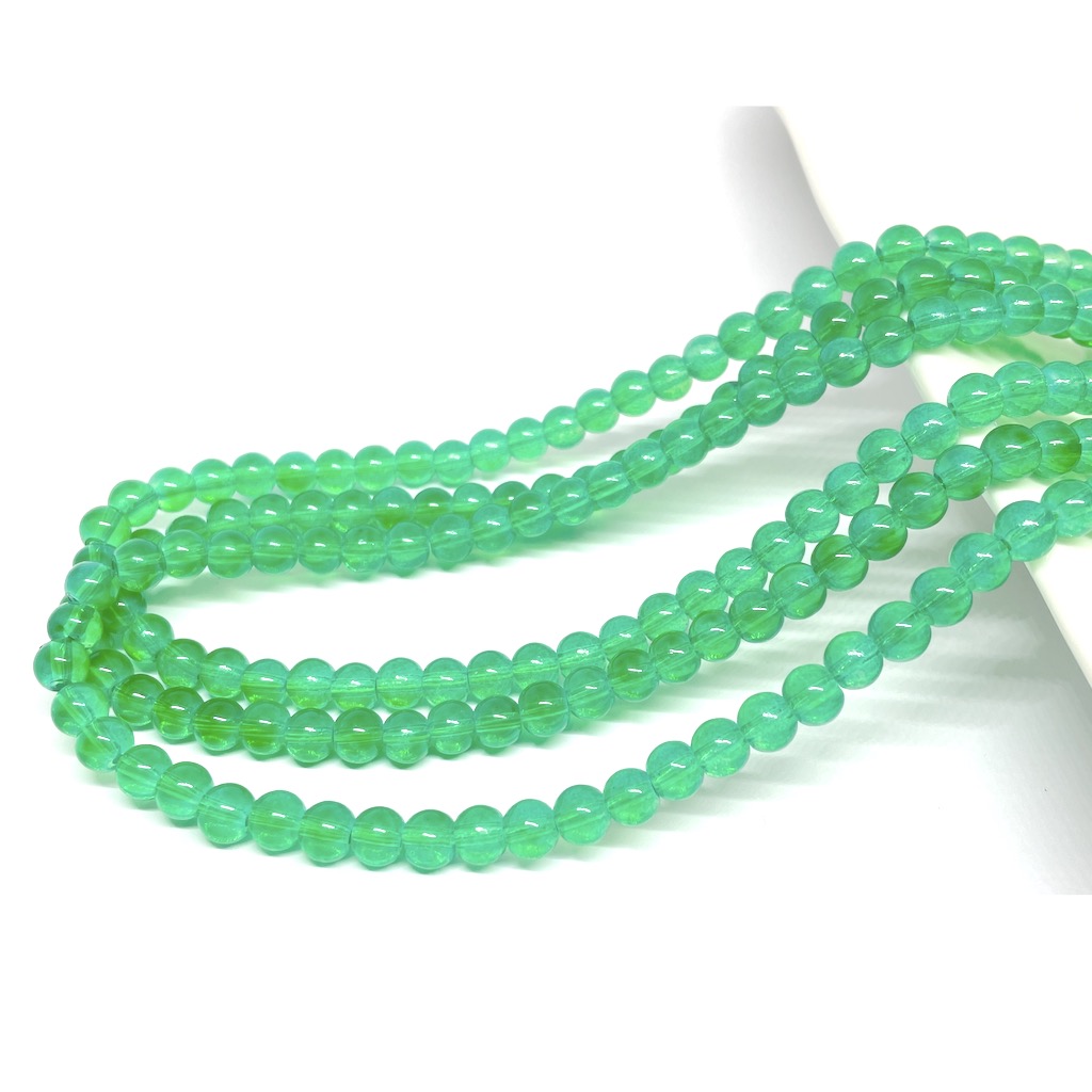 Perla de vidrio - 6mm - Tira 70und aprox. - Verde Transparente