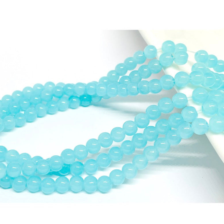 Perla de vidrio - 6mm - Tira 70und aprox. - Celeste claro