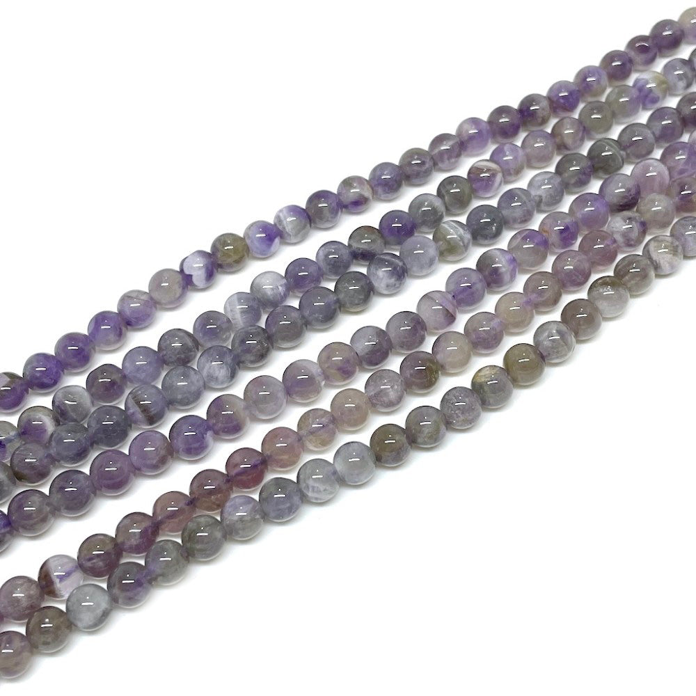 Amatista manchada - 6mm - 55 cuentas aprox.