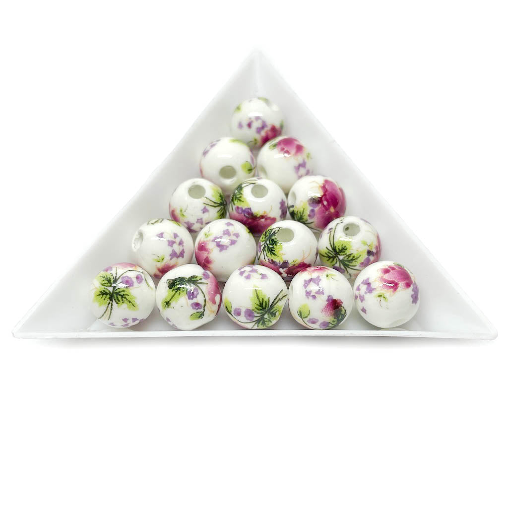 Bola de cerámica 10mm - Blanco con flores Fucsias - 6und