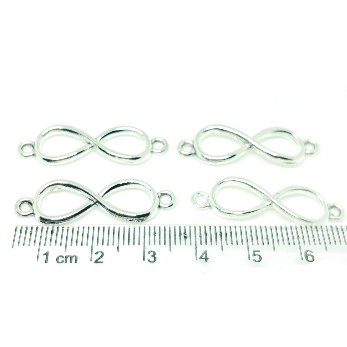 Conector Infinito c argollas - 30mm - Plateado - 4und