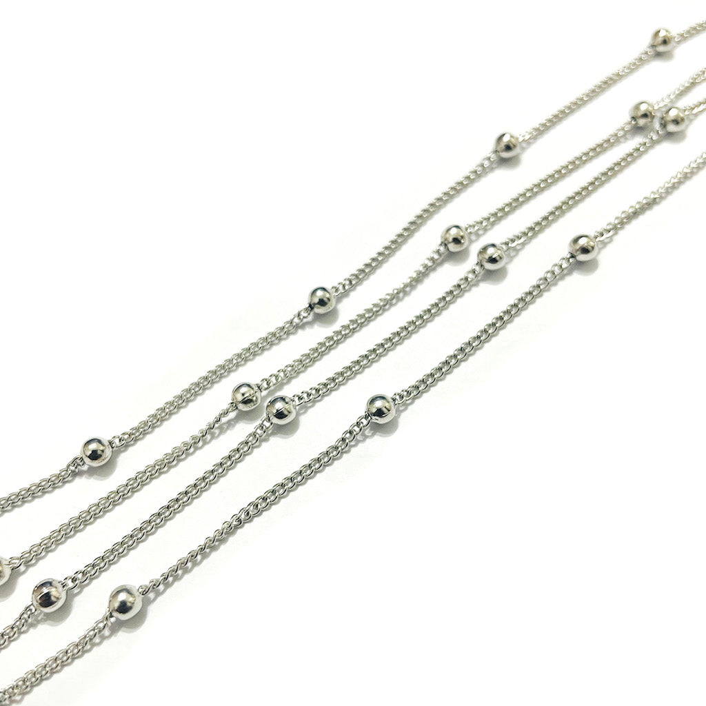 Cadena Niquelada eslabón plano con bolita 1x1mm | Por Metro
