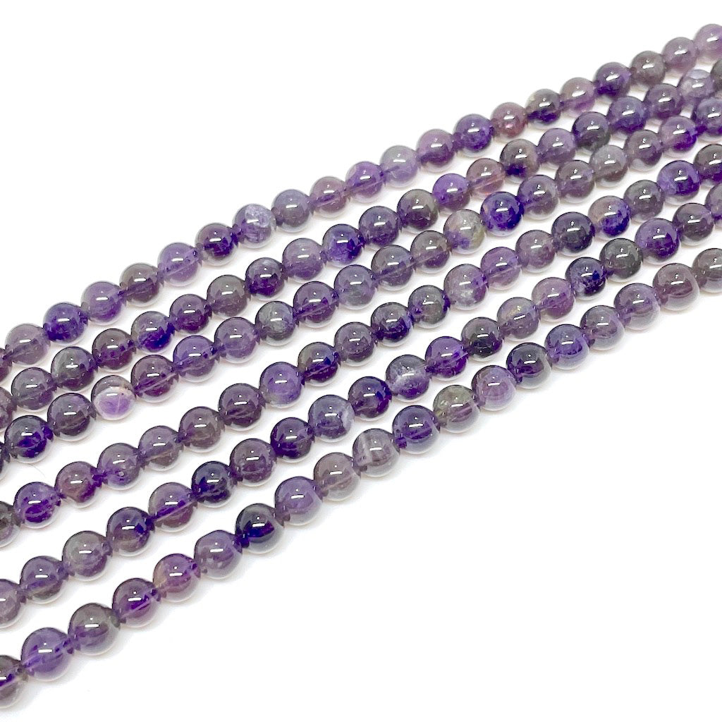 Amatista - 6mm - 55 cuentas aprox.
