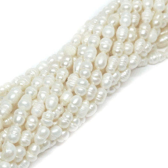 Perla de Río Blanca alargada irregular - 6x4mm aprox.
