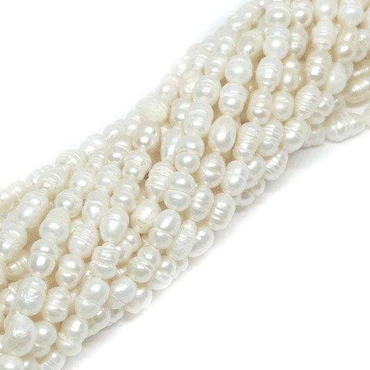 Perla de Río Blanca alargada irregular - 6x4mm aprox.