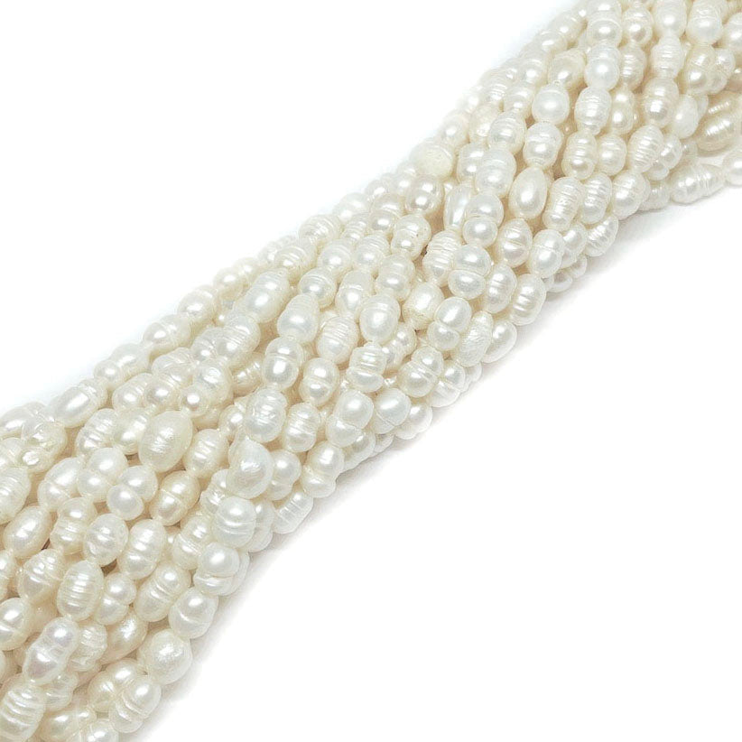 Perla de Río Blanca alargada irregular - 6x4mm aprox.